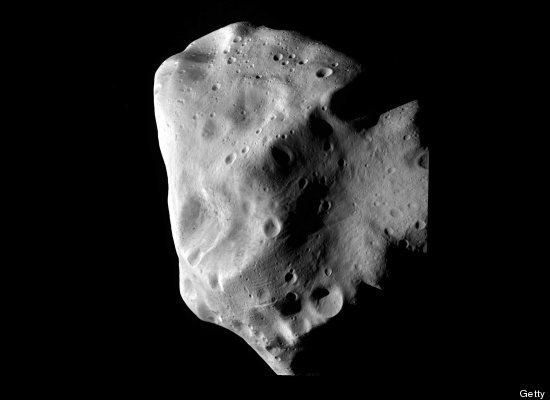 6350d1320612049-asteroid-2005-yu55-narrowly-miss-earth-slide_195915_454876_large.jpeg