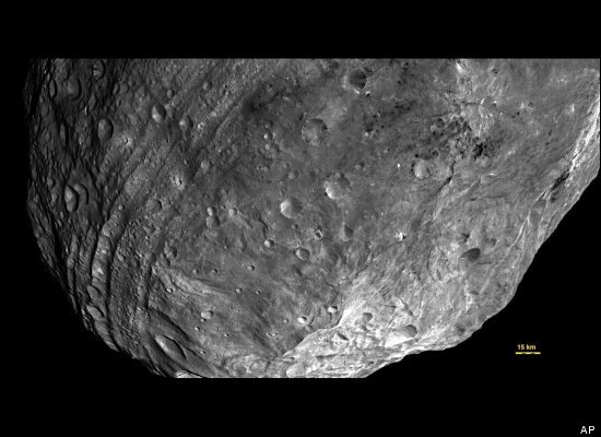 6352d1320612049-asteroid-2005-yu55-narrowly-miss-earth-slide_195915_454887_large.jpeg