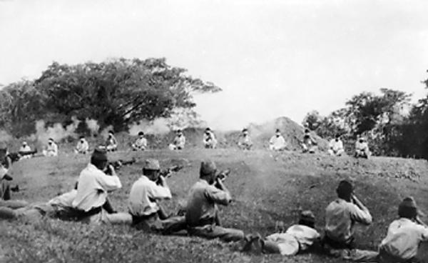 Japanese soldiers using Sikh prisoners for target practice.