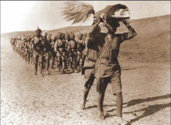 Sikhs marching in Mesopotamia with Guru Granth Sahib.