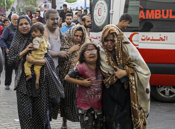 Injured Palestinians arrive at al-Shifa Hospital following Israeli airstrikes on Gaza City, central Gaza Strip, Monday, Oct. 16, 2023. (AP Photo/Abed Khaled, File)