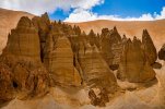 Sharpened tops of sandy mountains by winds.jpg