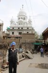 Writer in front of the Gurdwara Leh City.jpg