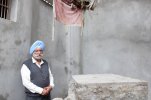 Writer near the seat of meditation of Guru Nanak in Leh.jpg