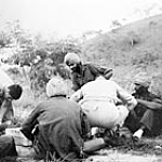 A group of Sikh POWs liberated from
the Japanese when American troops
attacked the Admiralty Islands are
given medical attention at an
Australian base in New Guinea,
12 May 1944.