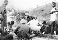 A group of Sikh POWs liberated from
the Japanese when American troops
attacked the Admiralty Islands are
given medical attention at an
Australian base in New Guinea,
12 May 1944.