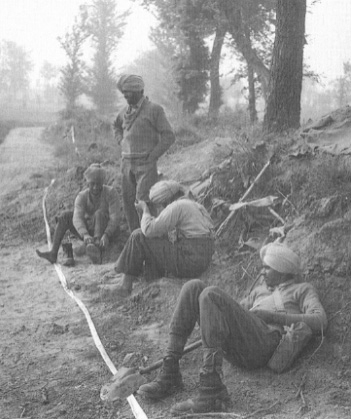 Engineers of the 8th Indian Division rest on the morning of 12 May 1944. They spent the previous night clearing enemy mines planted on the Gustav Line, allowing infantry and armour to break through during the drive that would take the Allies north to Rome.