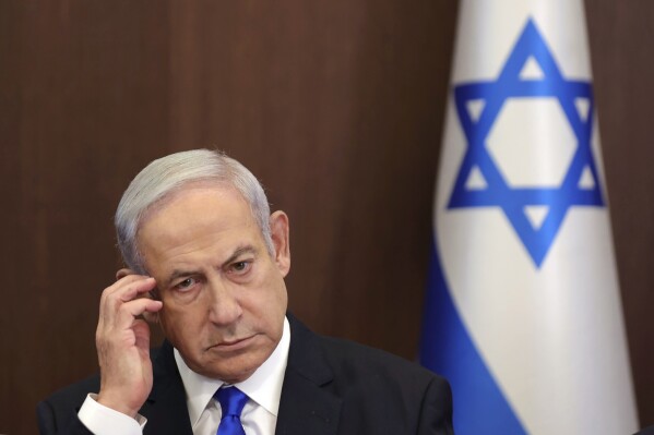 FILE - Israeli Prime Minister Benjamin Netanyahu attends the weekly cabinet meeting in the prime minister's office in Jerusalem, June 25, 2023. (Abir Sultan/Pool Photo via AP, File)